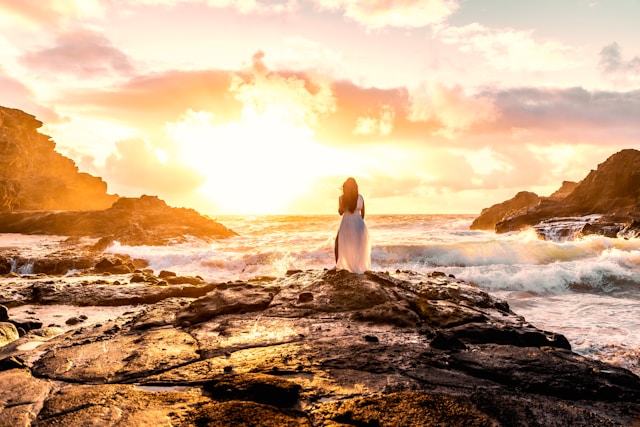 Woman sea sunset